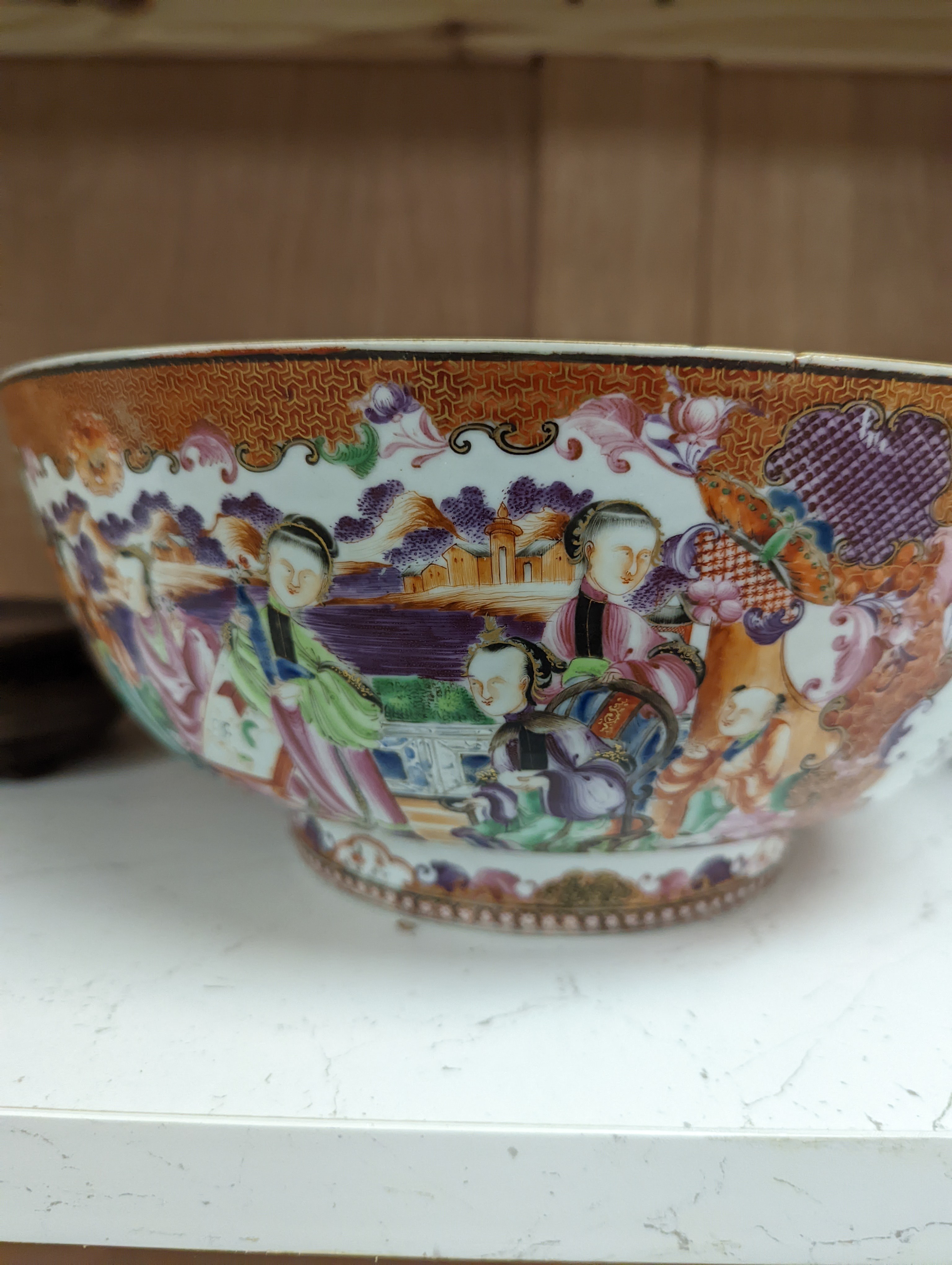 An 18th century Chinese export mandarin pattern porcelain bowl with hardwood stand 28.5cm diameter